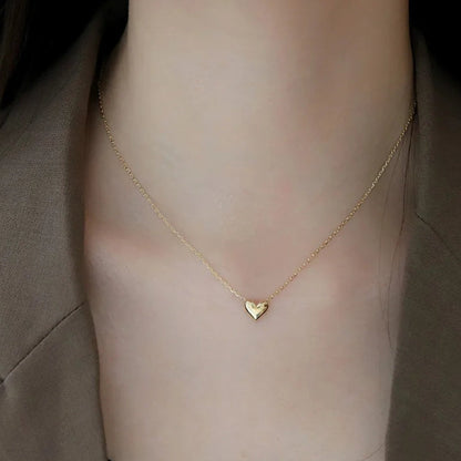 Colgante de corazón en acero inoxidable.