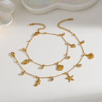 Elegante Lindo Básico Geométrico Estrella De Mar Delfín Acero Inoxidable 304 Chapados En Oro De 18K Circón Cadena Portacables Pulsera Con Múltiples Dijes.