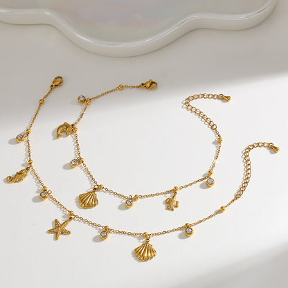 Tobillera Con Múltiples Dijes  marino, en acero inoxidable